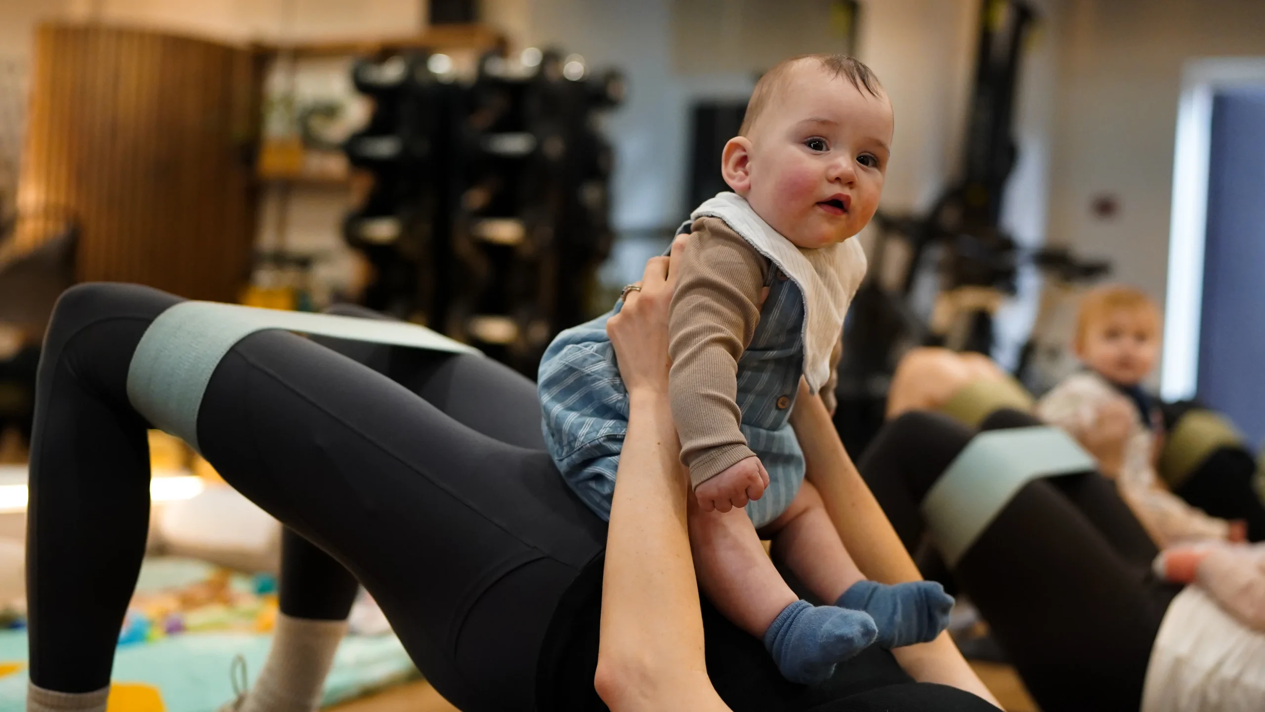 Her Fitness member with Her Baby